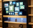 Panasonic mostra una TV trasparente integrata in una libreria