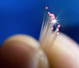Nuovo record mondiale di trasmissione dati su fibra: raggiunti i 57Gbps